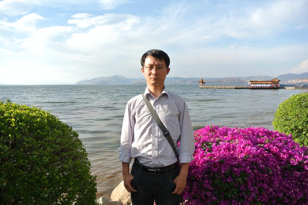 梁修贝